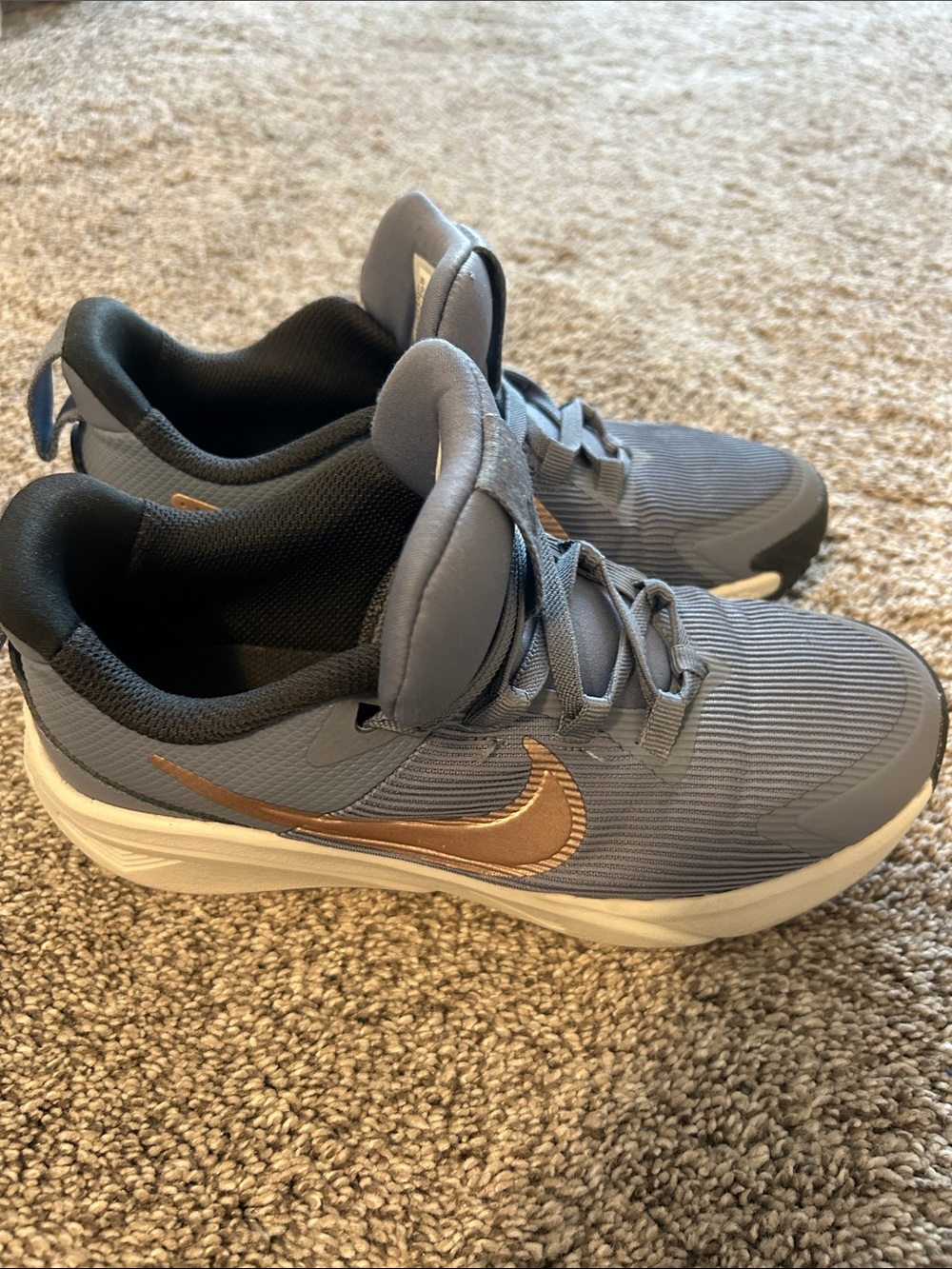 Nike blue Sneakers with rose Gold Swoosh